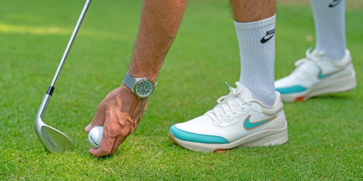 klocka på golfspelare